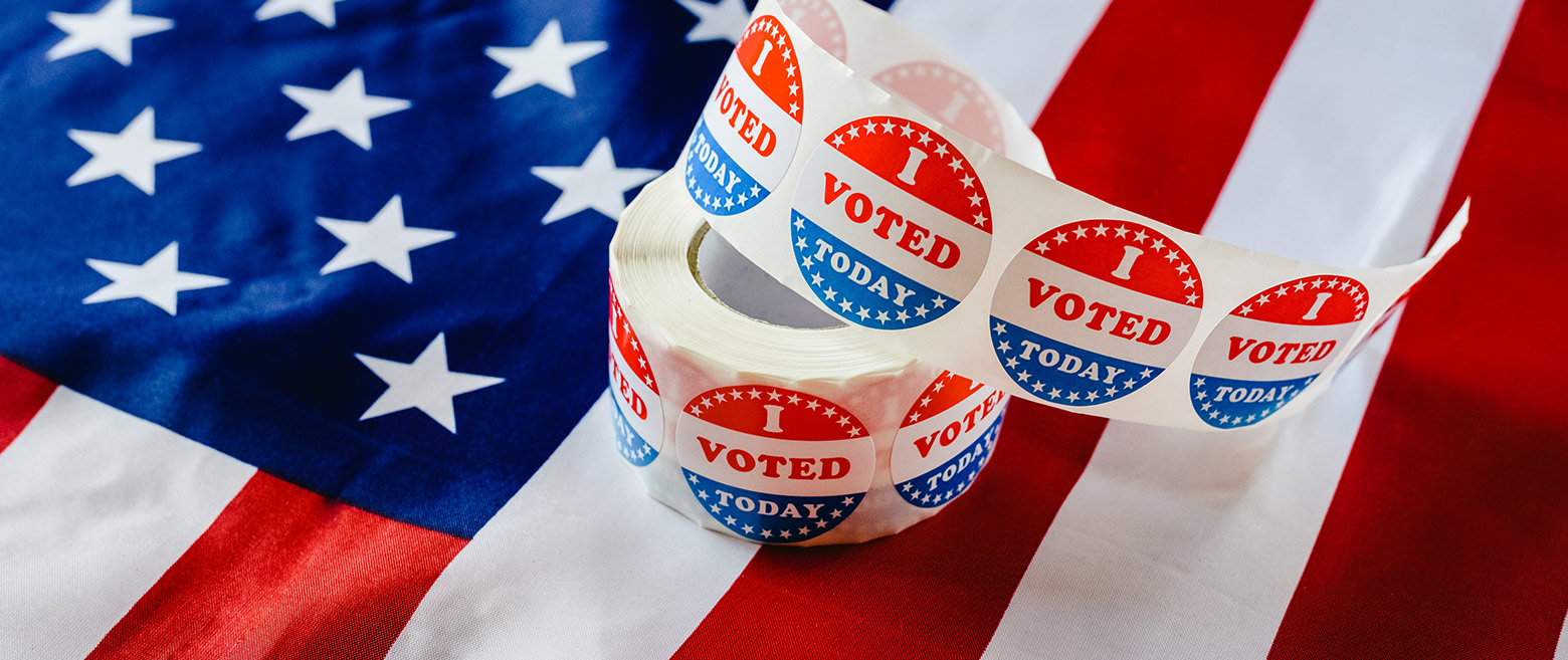 I voted today stickers on top of US flag